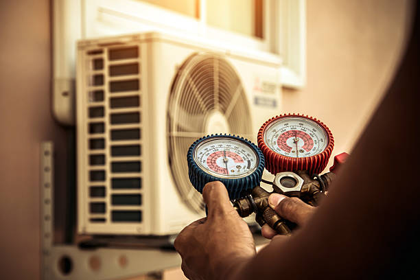 Professional Air Conditioning Service technician working in El Paso, TX
